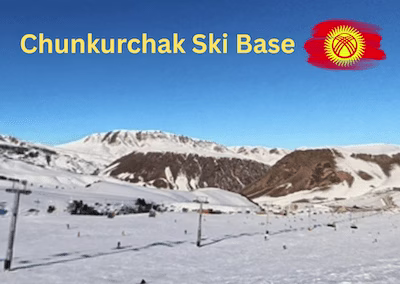 Skiing in Chunkurchak — wide gentle slopes with skiers near Bishkek, Kyrgyzstan